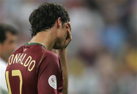 Portugal's Christian Ronaldo cries as he walks off the pitch after losing 1-0 to France in a World Cup semifinal soccer match between Portugal and Fra